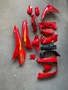 CUP KH 100 KAPORTA SETİ KIRMIZI (FAR+STOP YOK)